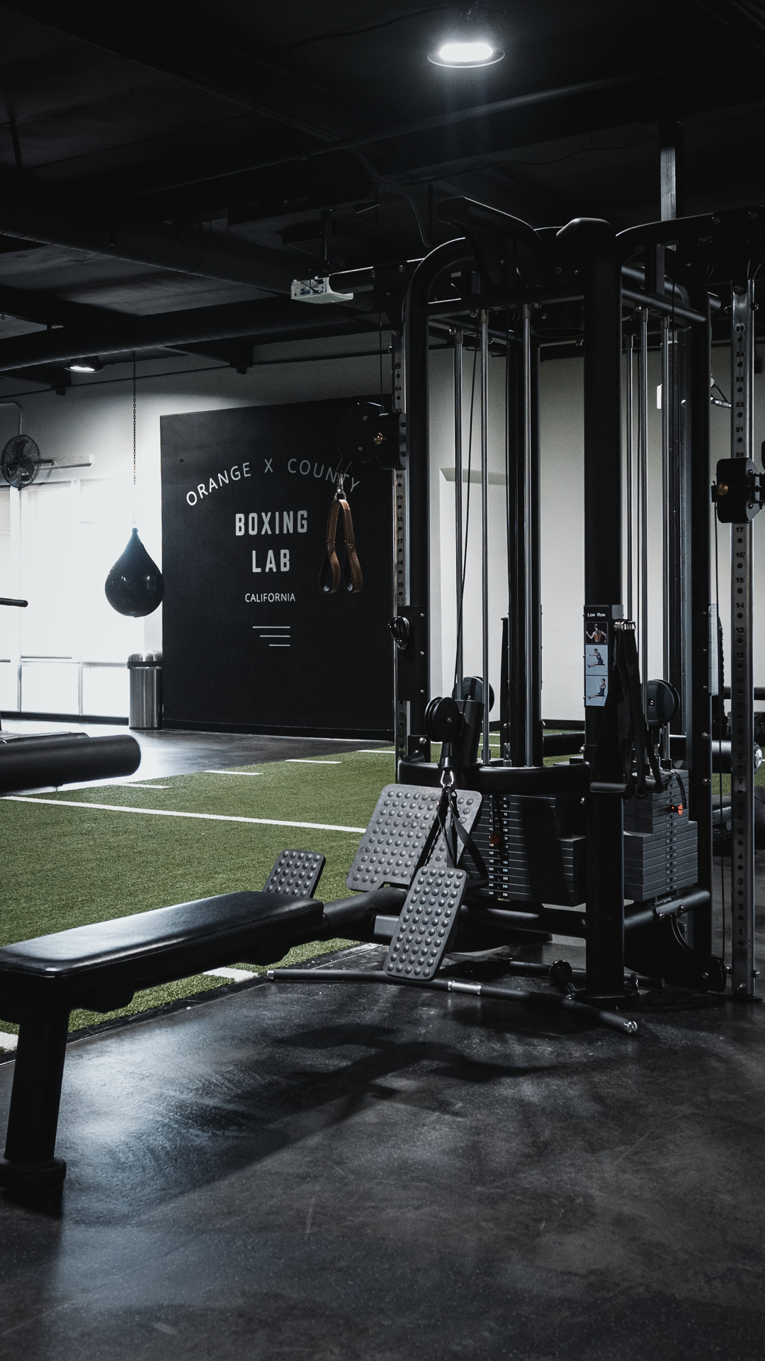 Boxing Lab training floor in Orange County with racks and turf